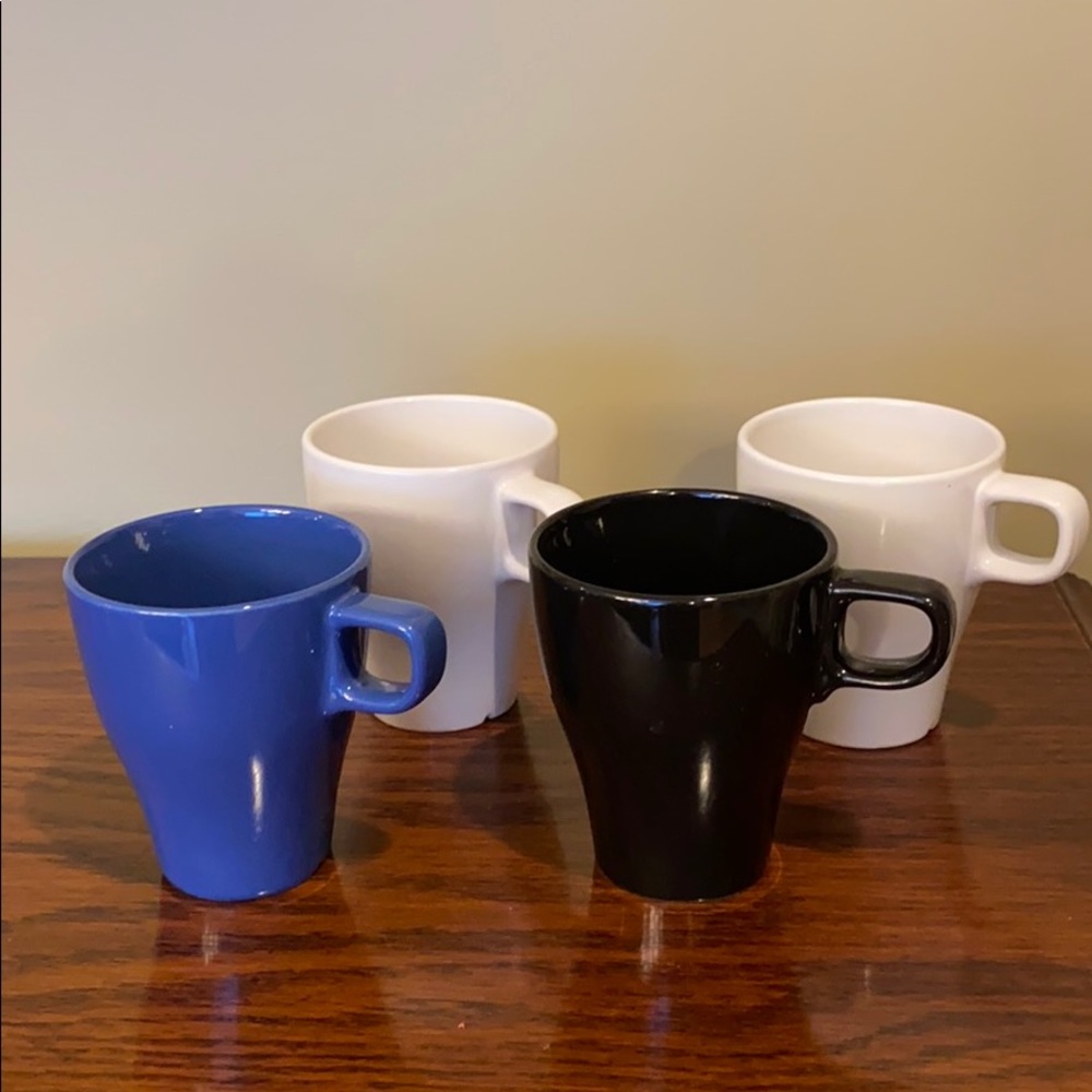 Set of 4 IKEA mugs ( 1 black 1 blue and 2 white )